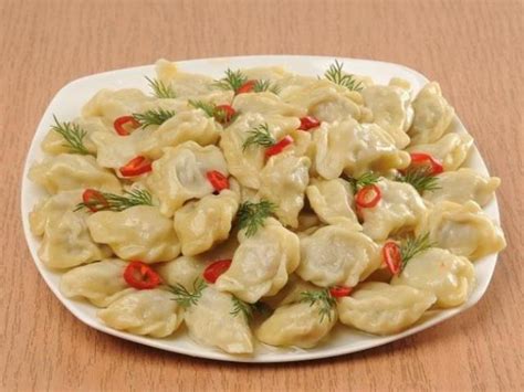 Вареники с начинкой из куриных отварных пупочков и картофельного пюре